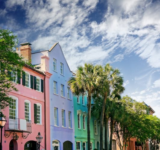 row of colorful residential buildings