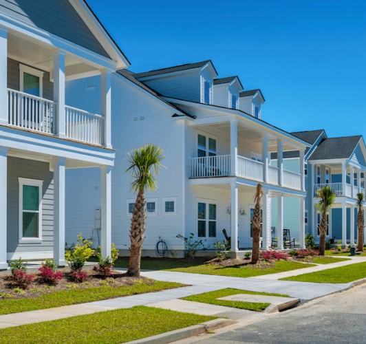 three residential two-story homes