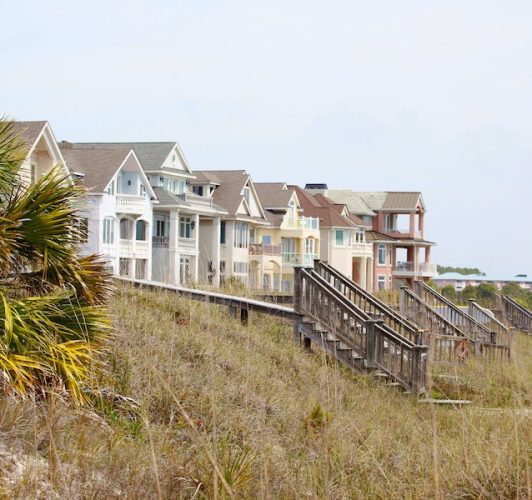row of homes with wooden docks