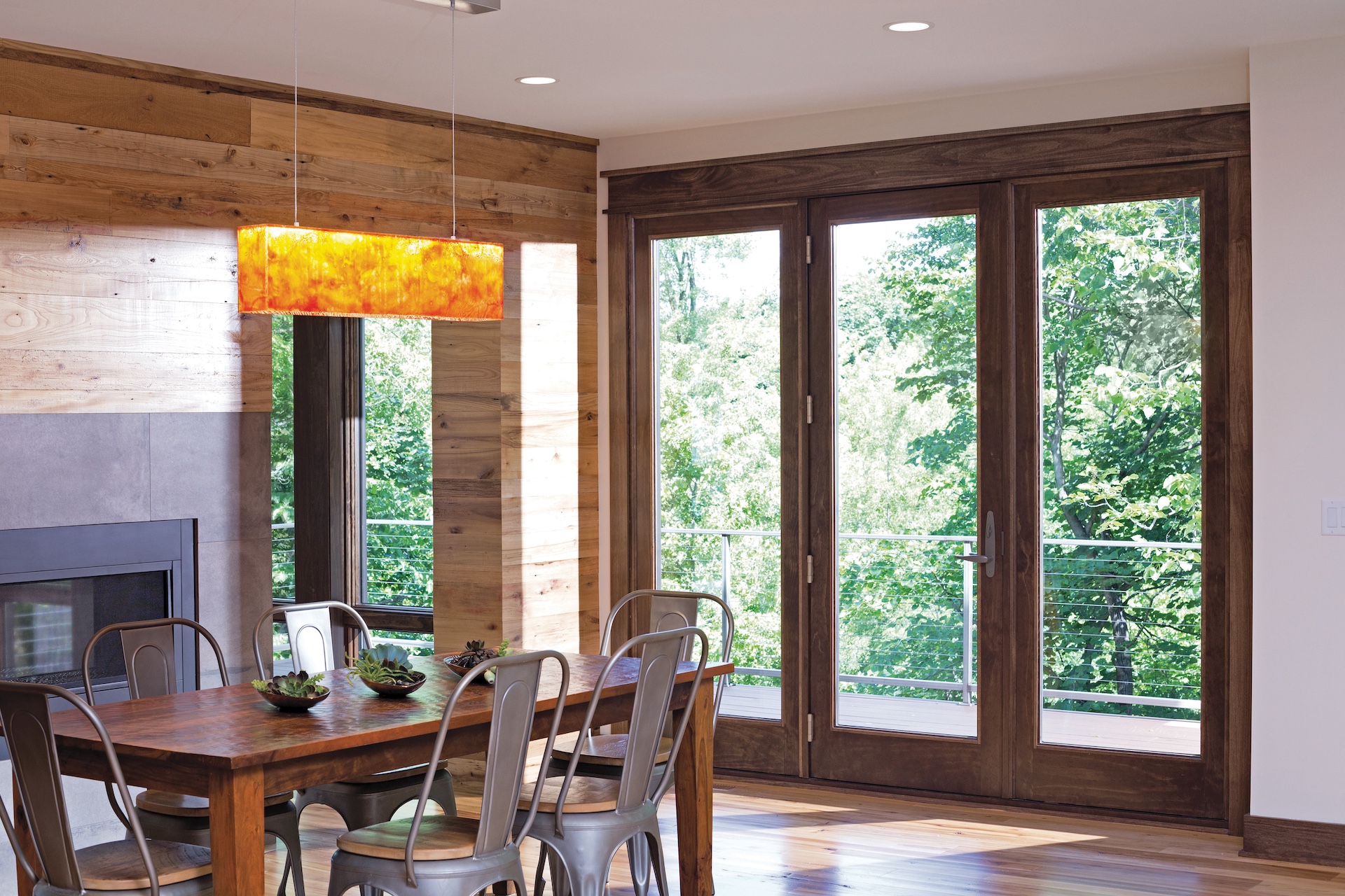 dining room with wooden patio door