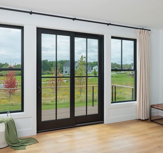 sliding patio door with dark frames