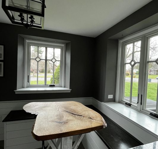 dining room corner with black walls